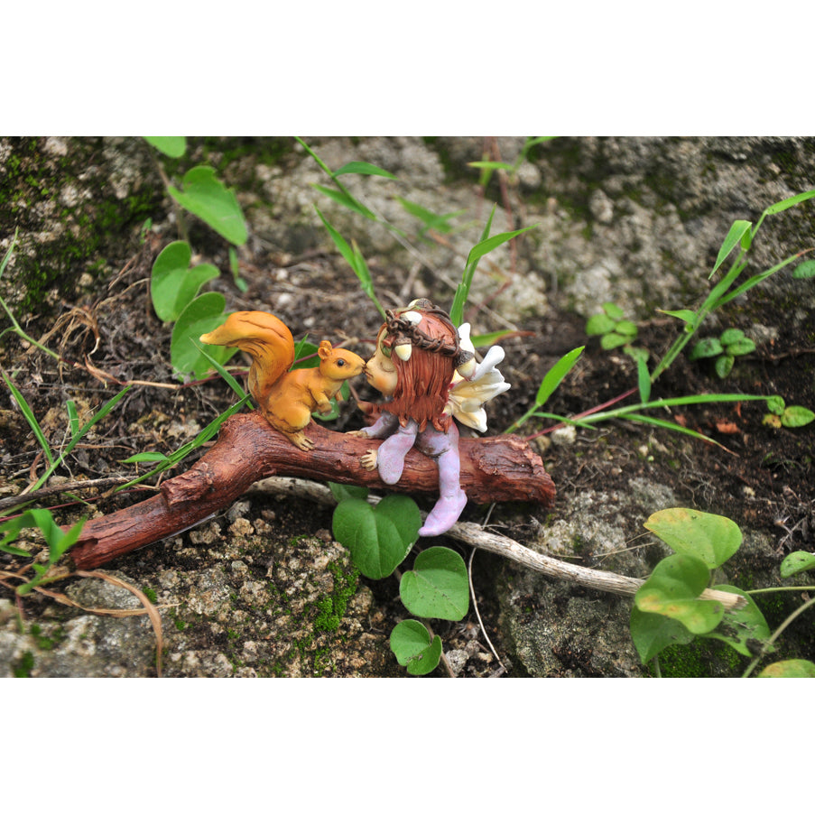 Little Fairy Kissing Squirrel on Branch