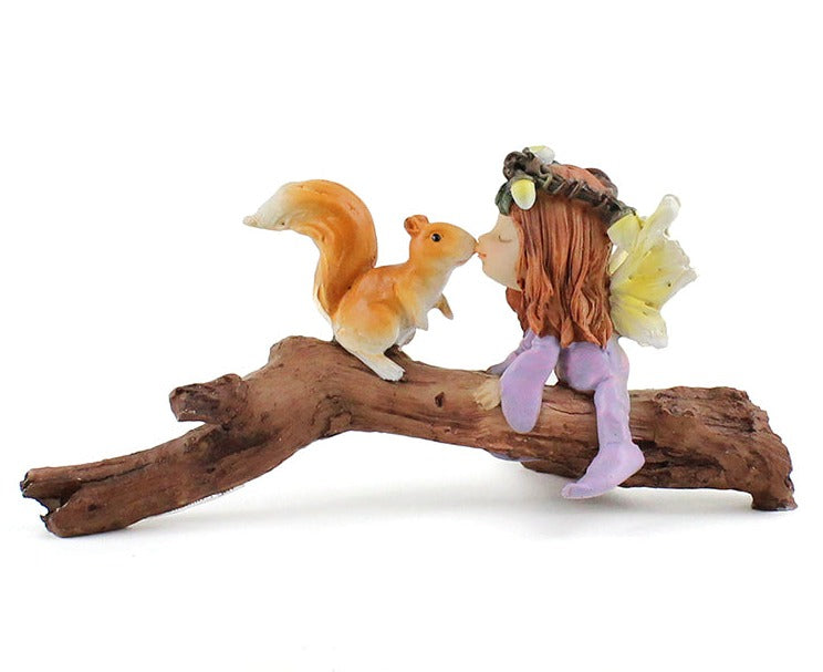 Little Fairy Kissing Squirrel on Branch