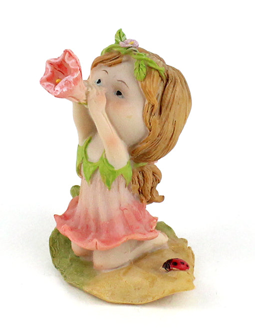 Little Fairy Blowing Flower