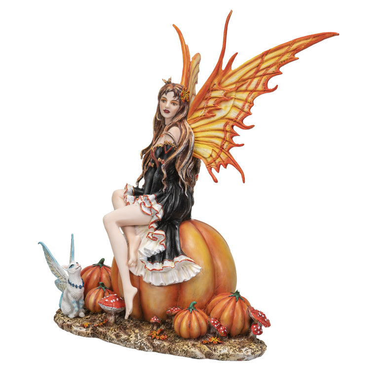 Fairy Sitting on Pumpkin